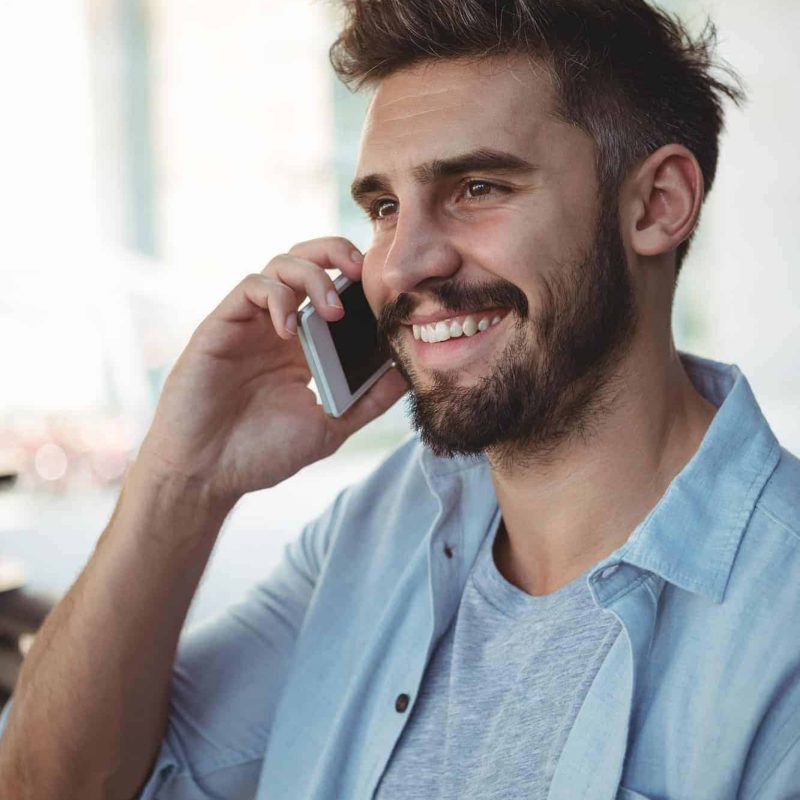 executive-talking-on-mobile-phone-in-park.jpg executive-talking-on-mobile-phone-in-park.jpg